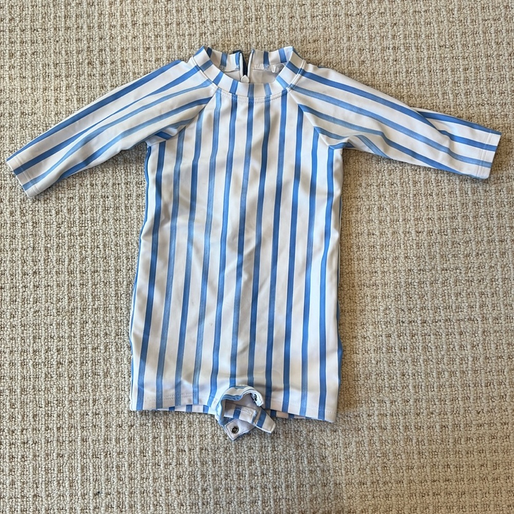 Minnow swimsuit. Size 0-6 months. Blue and white stripes.